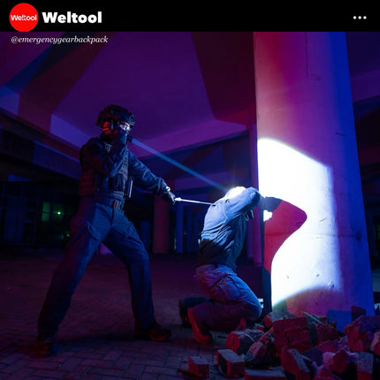 Weltool W7 in tactical action on a street at night.