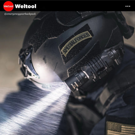 Weltool T17 on tactical helmet with 'Special Forces' patch and flashlight, featuring Weltool branding.