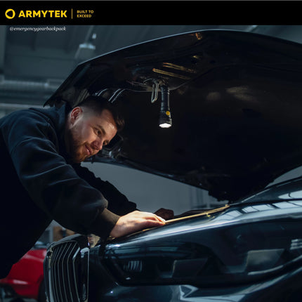 Armytek Prime C2 Pro Max Warm flashlight used as work light in workshop and tool storage area