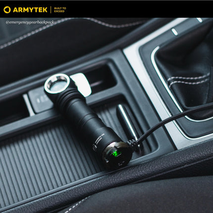 Armytek AMC-02 magnetic charger used with tactical flashlight in field setup