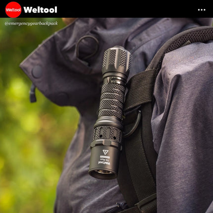 Weltool T8Plus Flashlight attached to a backpack with Weltool branding.